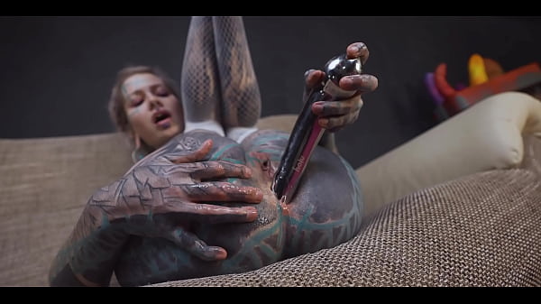 Anuskatzz stuffs her ass with a cold stainless steel dildo